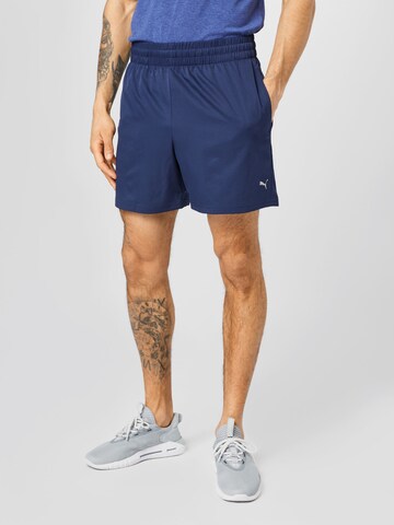 Regular Pantalon de sport PUMA en bleu : devant