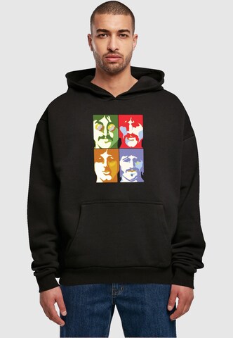 Merchcode Sweatshirt 'Beatles -  Color Heads' in Zwart: voorkant
