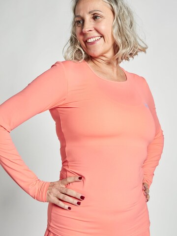 Maglia funzionale di SPORTKIND in arancione