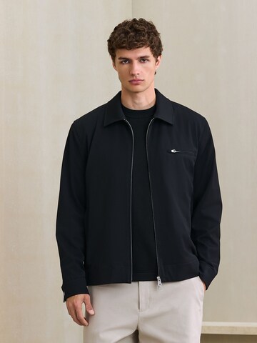 Next - Chaqueta de entretiempo 'Motionflex' en negro: frente