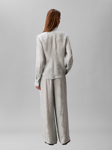 Calvin Klein Wide leg Pleat-front trousers in Blue