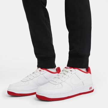 Nike Sportswear Дънки Tapered Leg Панталон в черно