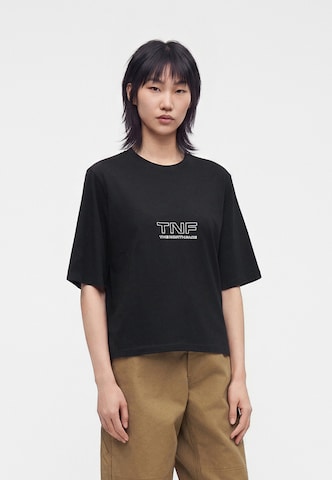 THE NORTH FACE T-shirt 'ZUMU 2.0' i svart: framsida
