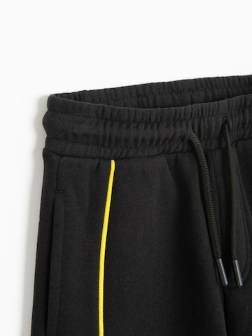 Effilé Pantalon Cool Club en noir