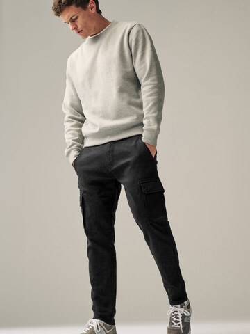 Next - Tapered Pantalón cargo en negro