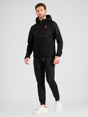 ELLESSE Between-Season Jacket 'Freccia' in Black