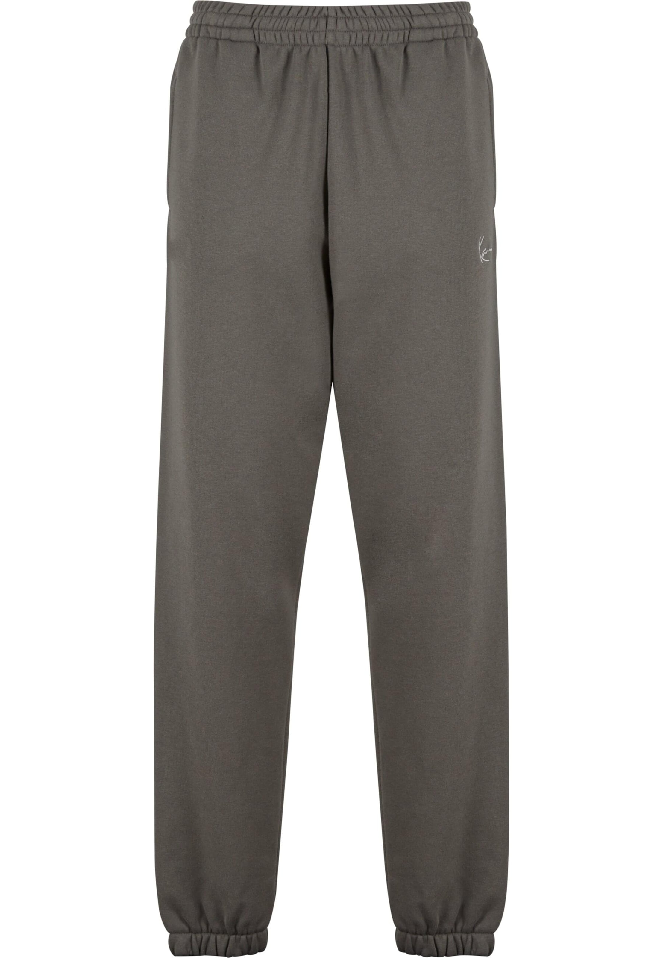 Karl Kani Tapered Trousers in Grey: front