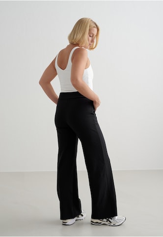 Bootcut Pantaloni sportivi 'Sense' di Aim'n in nero