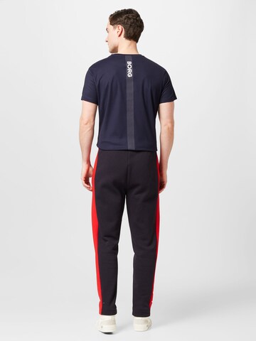LACOSTE Tapered Hose in Schwarz