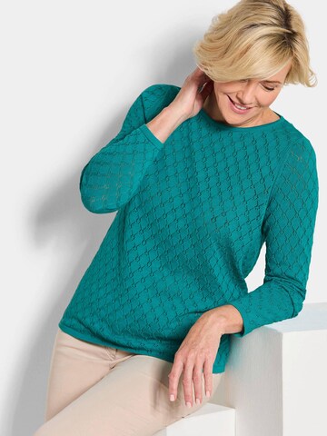 Pull-over Goldner en vert