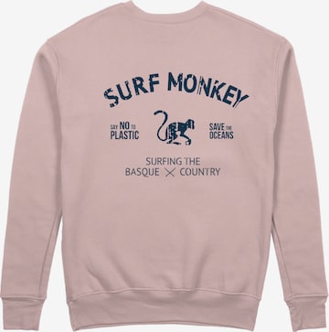 Sweat-shirt 'Rette das Ozean' Surf Monkey en rose : devant