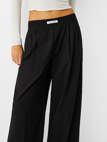 Bershka Wide leg Veckad byxa i svart