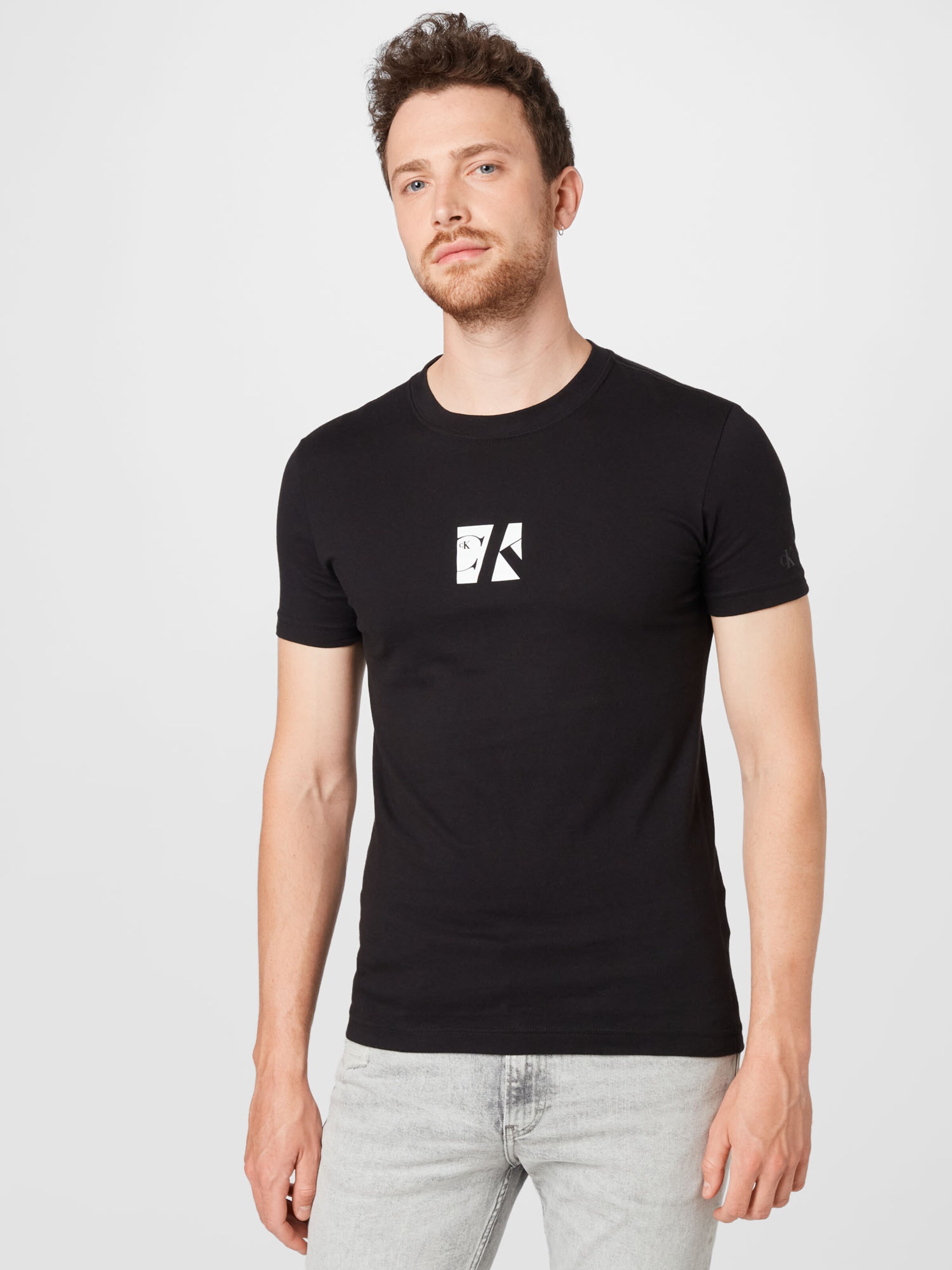 Männer Shirts Calvin Klein Jeans T-Shirt in Schwarz - XX65534