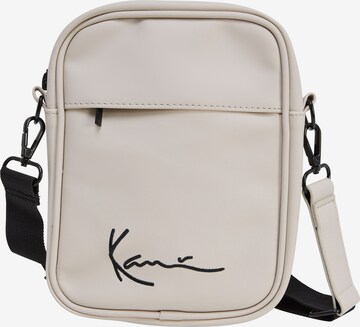 Karl Kani Crossbody Bag in Beige: front