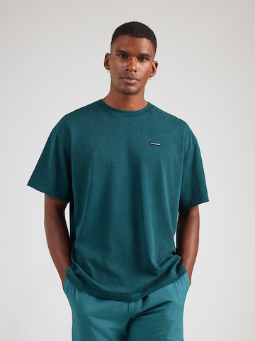 T-Shirt fonctionnel UNDER ARMOUR en vert : devant