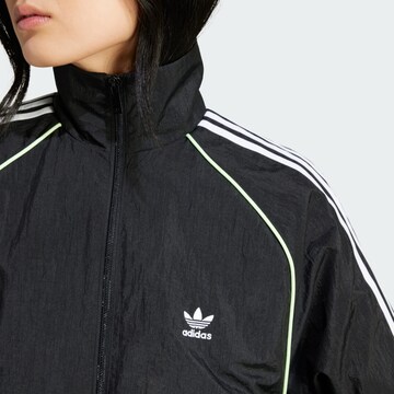 ADIDAS ORIGINALS Übergangsjacke in Schwarz