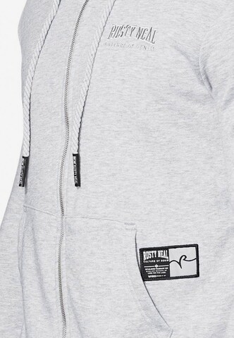 Rusty Neal Zip-Up Hoodie in Grey