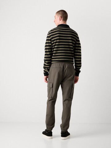 Calvin Klein Jeans Ozke Kargo hlače | siva barva