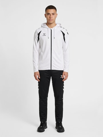 Veste de survêtement 'Core 2.0' Hummel en noir