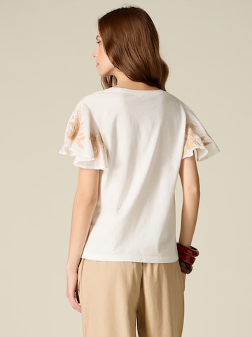 T-shirt oltre en blanc