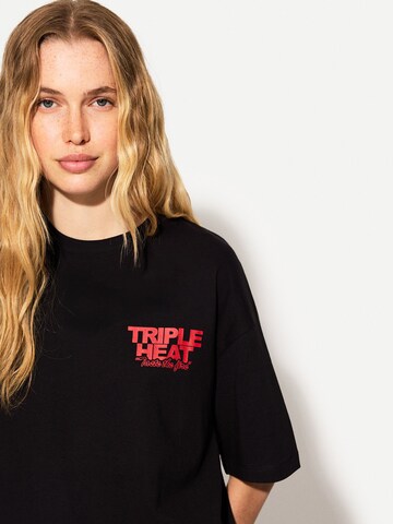 Tricou supradimensional de la Bershka pe negru