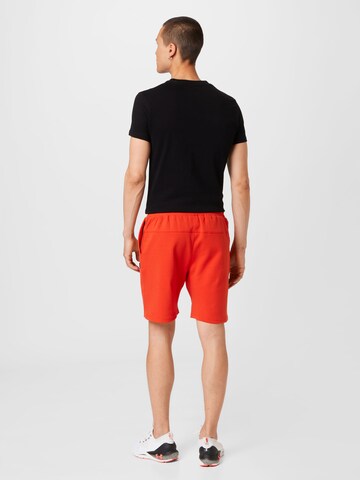 Superdry Regular Workout Pants in Orange