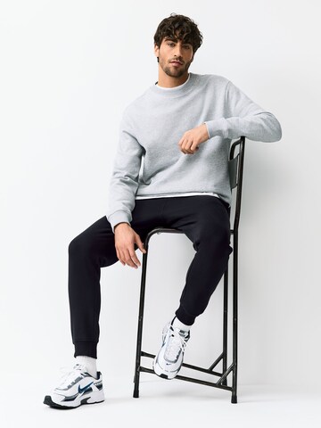 Next Tapered Broek in Blauw