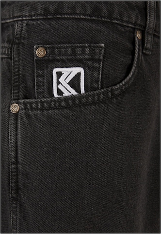 Tapered Jeans di Karl Kani in nero