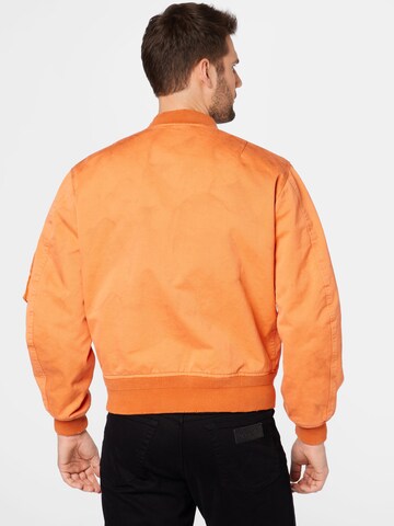 DIESEL Prehodna jakna | oranžna barva