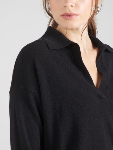 Pull-over Sisley en noir