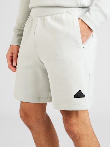 ADIDAS SPORTSWEAR Ohlapna forma Športne hlače 'Z.N.E. Premium' | siva barva