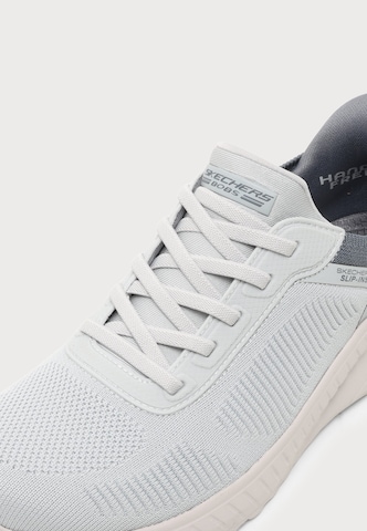 Scarpa slip-on 'BOBS SQUAD CHAOS - CURRENT MU' di SKECHERS in grigio