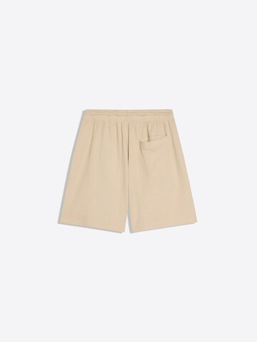 Loosefit Pantaloni con pieghe di Bershka in marrone