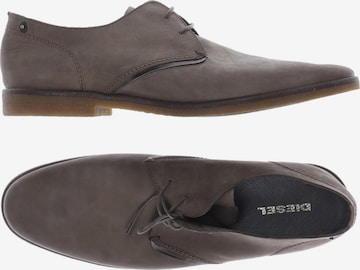 DIESEL Flats & Loafers in 43 in Brown: front