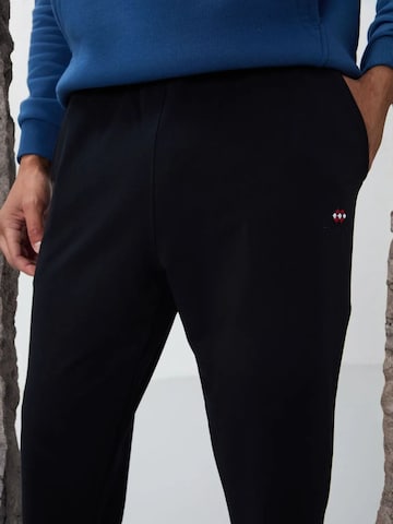Regular Pantalon Tommy Life en noir
