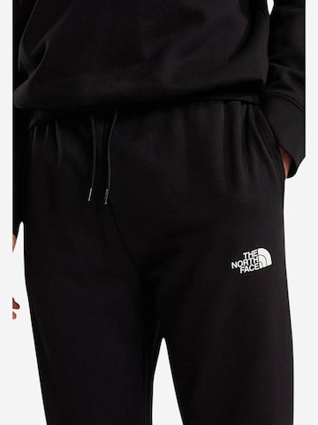 regular Pantaloni sportivi 'M SIMPLE DOME JOGG NF0A8C41' di THE NORTH FACE in nero