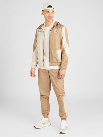 PUMA - Chaqueta de chándal 'Manchester City Pre-Match' en beige