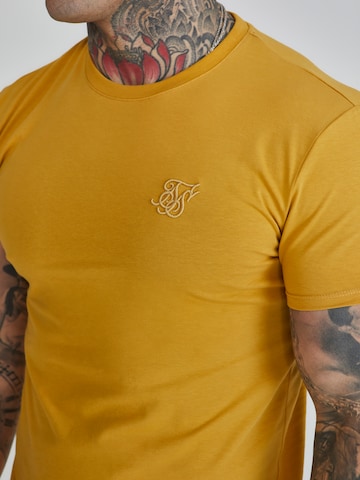 Maglietta di SikSilk in giallo