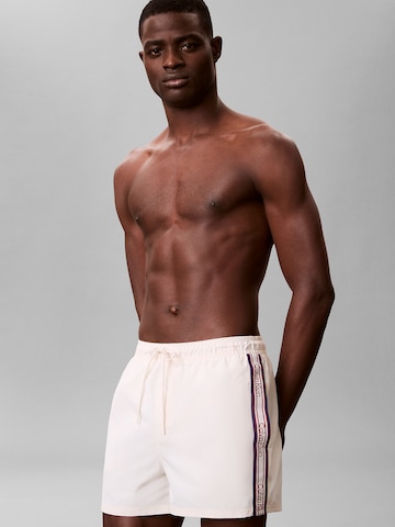 Calvin Klein Swimwear Regular Boxer shorts in Beige: front