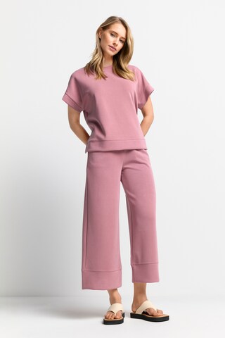 Rich & Royal - Perna larga Calças com pregas em rosa