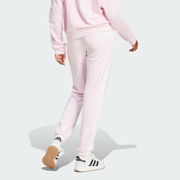 ADIDAS SPORTSWEAR Конический (Tapered) Спортивные штаны 'Essentials' в Ярко-розовый