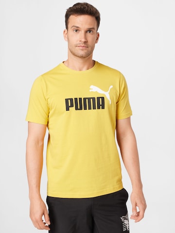 PUMA Performance Shirt 'Essentials' in Yellow: front