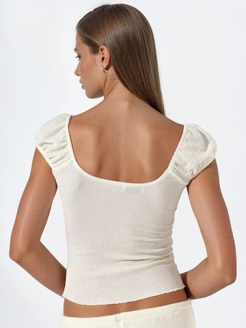 Haut Busem en beige