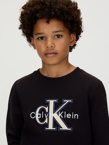 Calvin Klein Jeans Dressipluus 'FESTIVE', värv must