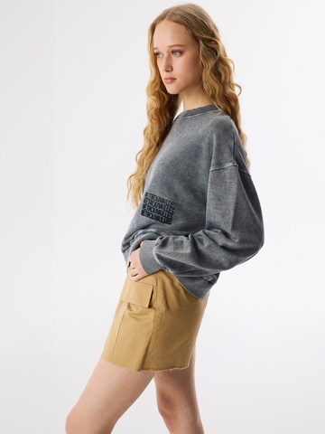 Sweat-shirt Twist en gris
