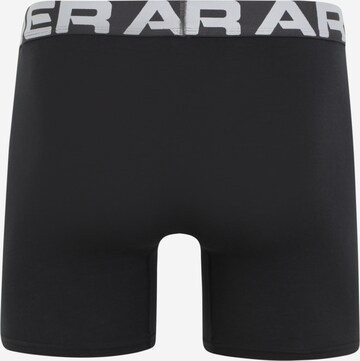 UNDER ARMOUR Regular Sportunterhose 'Charged' in Schwarz