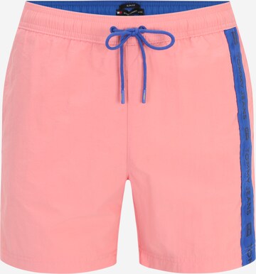 Shorts de bain Tommy Jeans en rose : devant