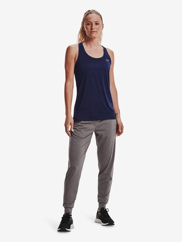 Effilé Pantalon de sport UNDER ARMOUR en gris