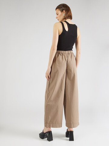 TOPSHOP Wide leg Veckad byxa i beige