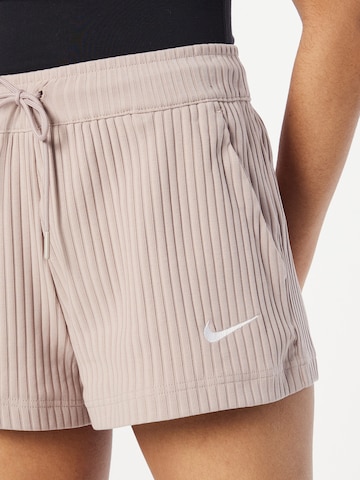 Nike Sportswear Regular Trousers in Beige
